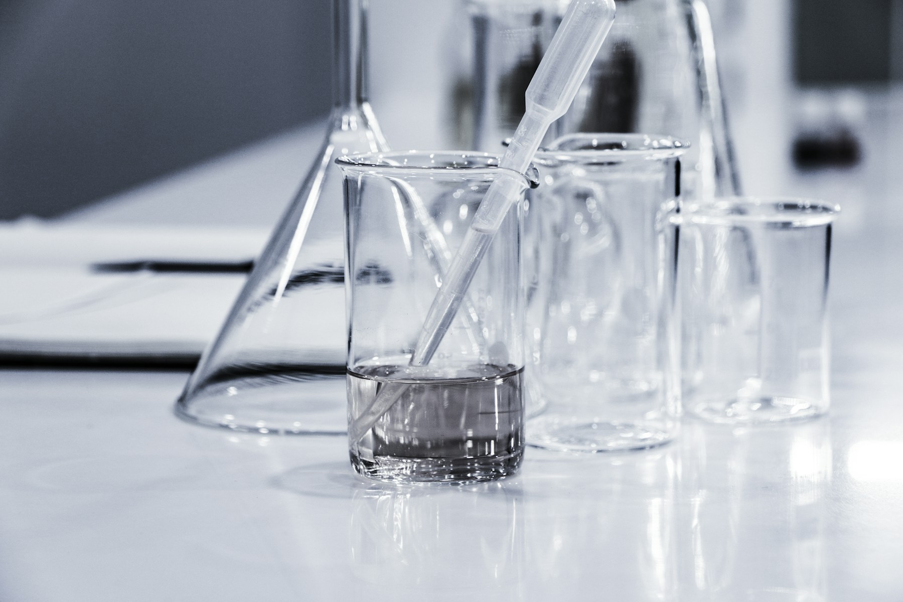 Water analysis lab beakers and pipette